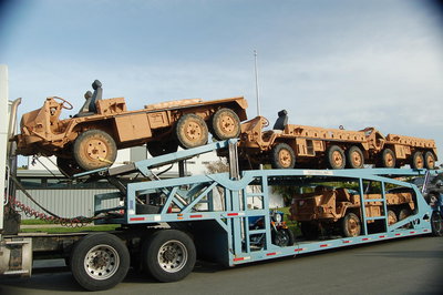 718 4 trucks on transport.jpg